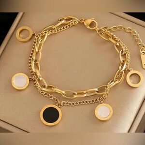 New Gold Plated Stainless Steel Fashion Bracelet with Roman Numeral Charms. NWT